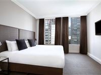 Deluxe One Bedroom Spa Apartments Bedroom-Mantra On Little Bourke