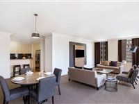 Deluxe One Bedroom Spa Apartments Lounge-Mantra On Little Bourke